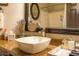 This bathroom features a vessel sink, granite countertop, and chrome faucet at 7027 W Blackhawk Dr, Glendale, AZ 85308