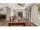 Bright dining room featuring a large table, with view to kitchen and living room at 717 N Mckemy Ave, Chandler, AZ 85226
