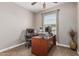 Home office with a desk, rolling chair, and a window at 717 N Mckemy Ave, Chandler, AZ 85226