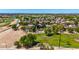 A charming neighborhood with well-maintained homes, pool, and lush greenery at 723 E Gemini Pl, Chandler, AZ 85249
