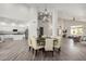 Open dining area with chandelier, kitchen access, and views of the living spaces at 723 E Gemini Pl, Chandler, AZ 85249