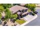 Beautiful two-story home featuring a three-car garage and stone accents at 723 E Gemini Pl, Chandler, AZ 85249
