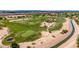 Scenic aerial view of a golf course with lush fairways and tranquil water features at 723 E Gemini Pl, Chandler, AZ 85249