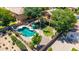 Aerial view of a backyard oasis with lush landscaping and a private pool at 723 E Gemini Pl, Chandler, AZ 85249