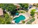 Relaxing pool area with a slide and diving board surrounded by mature trees at 723 E Gemini Pl, Chandler, AZ 85249