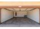 Spacious two-car garage with ample room for storage and vehicles at 7419 W Raymond St, Phoenix, AZ 85043