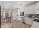 Charming kitchen features granite counters, stainless appliances, tile backsplash and adjacent dining area at 7736 W Tumblewood Dr, Peoria, AZ 85382