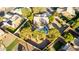 Overhead view of a home with a backyard featuring a pool, patio, and mature trees at 780 W Morelos Ct, Chandler, AZ 85225