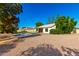 Backyard with a refreshing pool and a practical gravel landscape at 780 W Morelos Ct, Chandler, AZ 85225