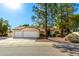 Charming home featuring a lush lawn and mature shade trees enhancing its curb appeal on a sunny day at 780 W Morelos Ct, Chandler, AZ 85225