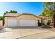 Inviting single-story home with a neutral facade, well-kept landscaping and a spacious three-car garage at 780 W Morelos Ct, Chandler, AZ 85225