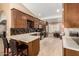 Well-appointed kitchen featuring custom cabinetry, granite countertops, and stainless steel appliances at 780 W Morelos Ct, Chandler, AZ 85225
