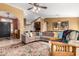 Inviting living room with high ceilings, stylish furniture, and an open floor plan at 780 W Morelos Ct, Chandler, AZ 85225