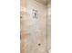 Tiled shower featuring a bench and integrated shelves for storage at 780 W Morelos Ct, Chandler, AZ 85225