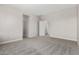A carpeted bedroom features an open door frame and neutral walls, creating an airy and inviting space at 9366 E Sequence Ave, Mesa, AZ 85212