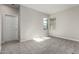 Bedroom featuring plush carpeting, a neutral color scheme, and ample natural light at 9366 E Sequence Ave, Mesa, AZ 85212