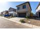 New construction home featuring a two car garage, low maintenance landscaping and a long drive way at 9366 E Sequence Ave, Mesa, AZ 85212