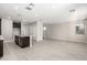 Open-concept kitchen with a dark wood island and modern stainless steel appliances at 9366 E Sequence Ave, Mesa, AZ 85212