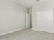Neutral bedroom with a carpeted floor and a closet with mirrored sliding doors at 9416 E Sequence Ave, Mesa, AZ 85212