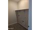 A dedicated laundry room featuring tile flooring and utility hookups at 9416 E Sequence Ave, Mesa, AZ 85212