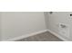 Laundry room featuring tile floors, and hookups for a washer and dryer at 9416 E Sequence Ave, Mesa, AZ 85212