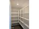 Walk-in pantry with lots of shelving space for organized storage solutions at 9416 E Sequence Ave, Mesa, AZ 85212