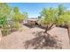 Aerial view of the backyard with patio, desert landscaping and block wall for privacy at 11030 N 47Th Ave, Glendale, AZ 85304