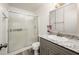 Bathroom featuring shower, granite countertops, and vanity at 11030 N 47Th Ave, Glendale, AZ 85304