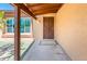 Covered entryway with a security door and a view of the interior at 11030 N 47Th Ave, Glendale, AZ 85304
