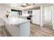 Updated kitchen features gray cabinets, modern appliances, and stylish countertops at 11030 N 47Th Ave, Glendale, AZ 85304