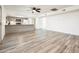 Open floor plan showcases the living room and kitchen with modern countertops at 11030 N 47Th Ave, Glendale, AZ 85304