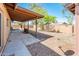 A covered patio and privacy fence make for enjoyable outdoor space in this back yard at 11030 N 47Th Ave, Glendale, AZ 85304