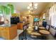 Open concept dining area adjacent to the kitchen with elegant furnishings at 111 N Soho Pl, Chandler, AZ 85225
