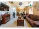 Cozy living room with comfortable seating, neutral decor, and ample natural light at 111 N Soho Pl, Chandler, AZ 85225