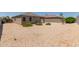 Spacious backyard with desert landscaping and privacy fence, offering a low-maintenance outdoor space at 11303 E Sunflower Ct, Florence, AZ 85132