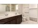 Spacious bathroom with double sink vanity, tile flooring, and a separate shower at 11303 E Sunflower Ct, Florence, AZ 85132