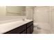 Standard bathroom with vanity, tile floor, and tub/shower combo at 11303 E Sunflower Ct, Florence, AZ 85132