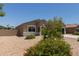 Charming single-story home featuring low-maintenance desert landscaping and a spacious two-car garage at 11303 E Sunflower Ct, Florence, AZ 85132