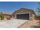 Charming single-story home featuring low-maintenance desert landscaping and a spacious two-car garage at 11303 E Sunflower Ct, Florence, AZ 85132