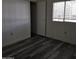 Bedroom with closet, new flooring and natural light at 11411 N 91St Ave # 188, Peoria, AZ 85345