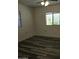 Neutral bedroom showcasing wood-look vinyl flooring and two windows at 11411 N 91St Ave # 188, Peoria, AZ 85345