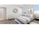 Serene bedroom featuring a neutral palette, natural light and contemporary decor, designed for relaxation at 11891 E Cliffrose Ln, Florence, AZ 85132