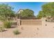 Attractive entrance to the Crossriver Summit community with lush landscaping at 12236 W Country Club Ct, Sun City, AZ 85373