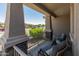 Charming front porch with comfortable seating and a view of the neighborhood at 12236 W Country Club Ct, Sun City, AZ 85373