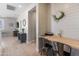 Hallway area with built in desk space and shiplap walls, perfect for a home office or study nook at 12236 W Country Club Ct, Sun City, AZ 85373