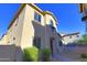 Well-maintained exterior view showcasing the home's architecture, desert landscaping, and private walled yard at 14861 W Ashland Ave, Goodyear, AZ 85395