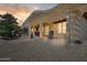 The covered patio offers ample grilling and entertaining space at 15532 W Prairie Dunes Dr, Surprise, AZ 85374