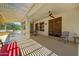 Inviting covered patio with plenty of seating and shade, ideal for relaxing and entertaining outdoors at 15532 W Prairie Dunes Dr, Surprise, AZ 85374