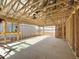 Interior view showcases exposed wood framing and the infrastructure during construction at 15752 W Camden Ave, Waddell, AZ 85355