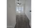 Bright bedroom boasting neutral carpet, bay windows and a ceiling fan at 1627 W Pueblo Ave, Mesa, AZ 85202